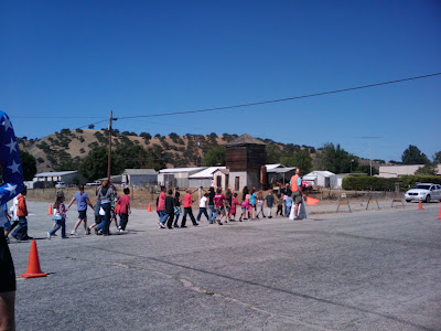 Kids in Bradley after cheering on the riders